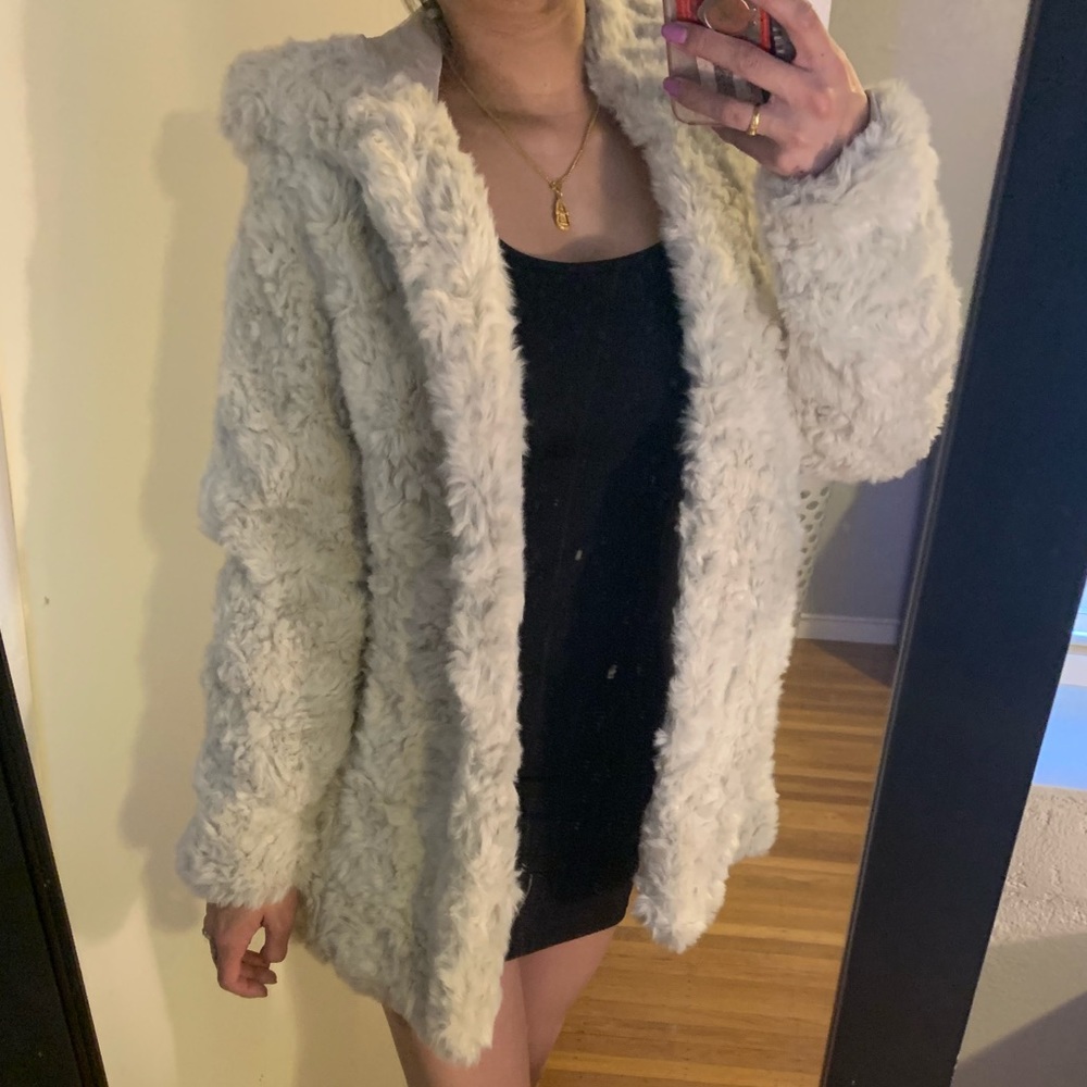 White faux fur coat